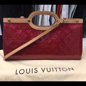 Louis Vuitton Clutch Roxbury