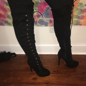 Thigh-high lace up stiletto over the knee boots
