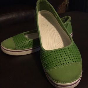 Green crocs flats