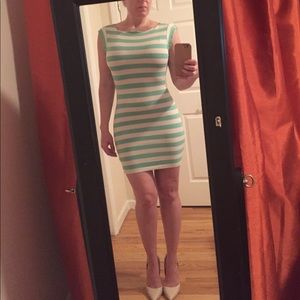 Green and white striped bodycon mini dress
