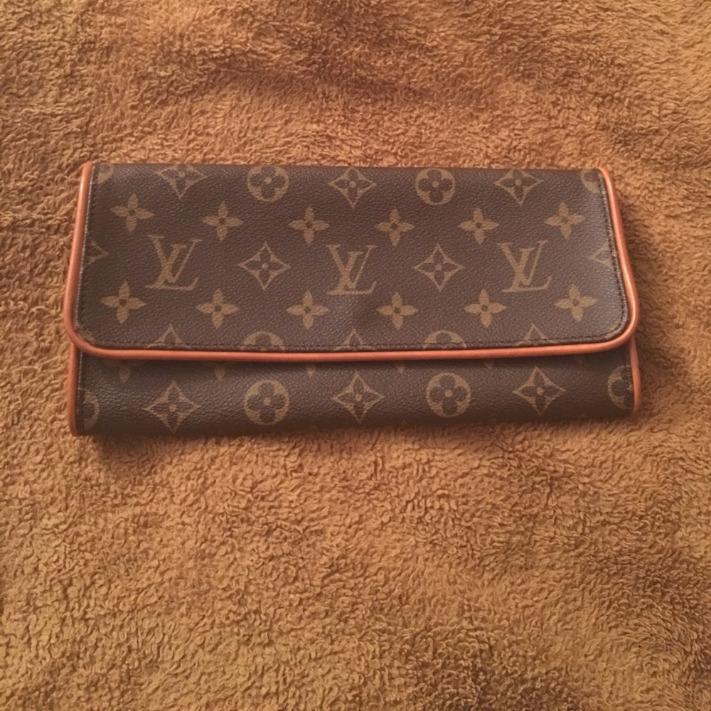 Authentic Louis Vuitton clutch w/strap & dust bag