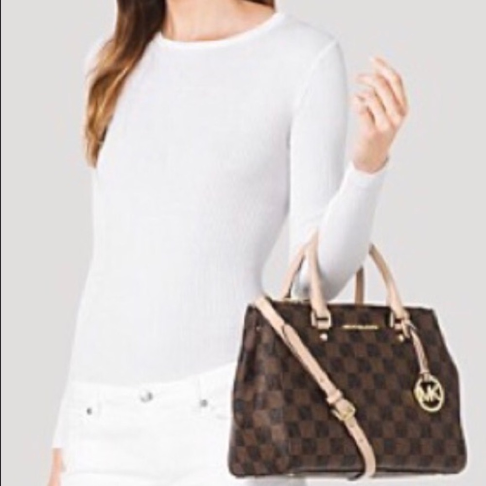 SOLD. Michael Kors Handbag and wristlet