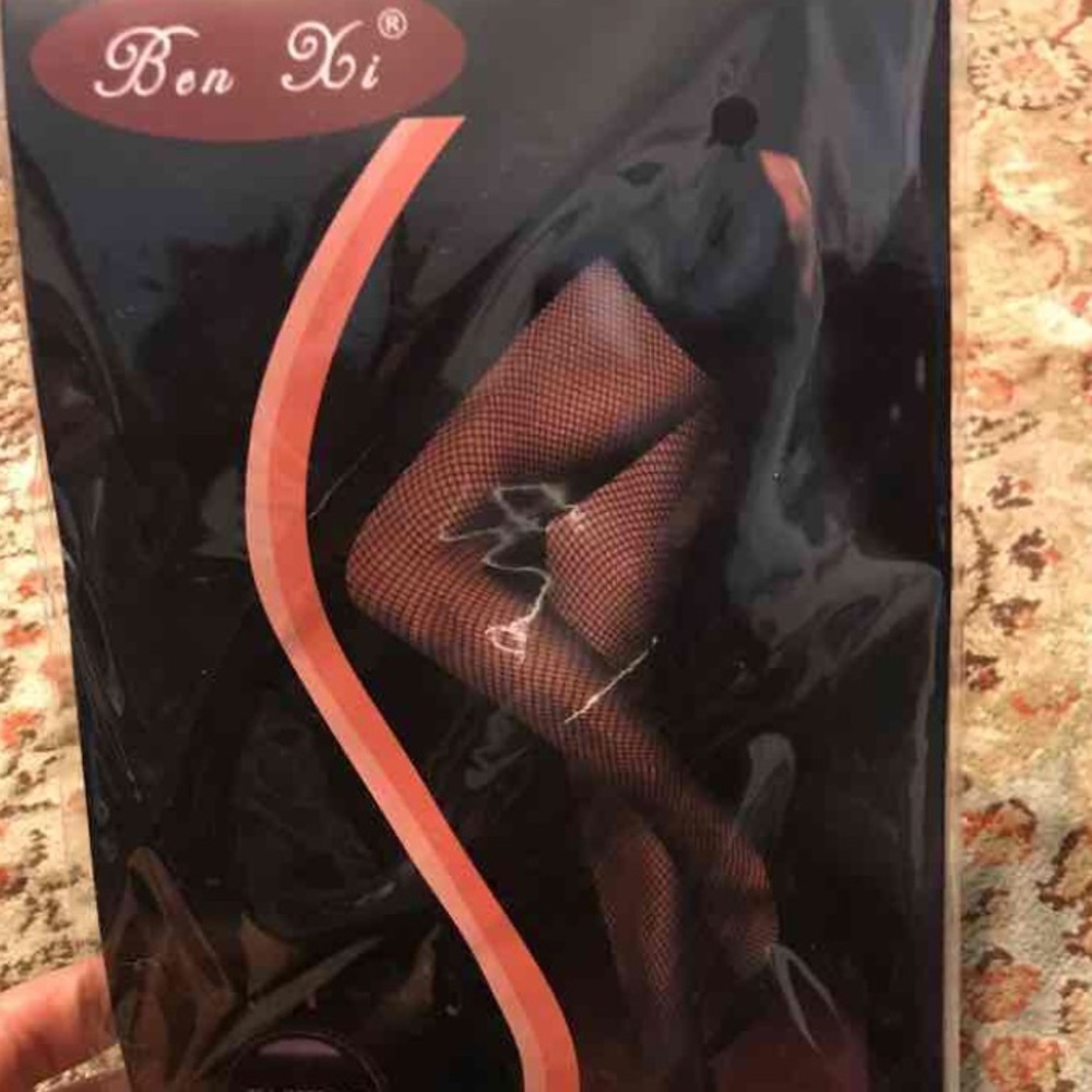 One pair of black fishnet tights