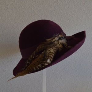 Vintage 1970s eggplant wool hat with feathers