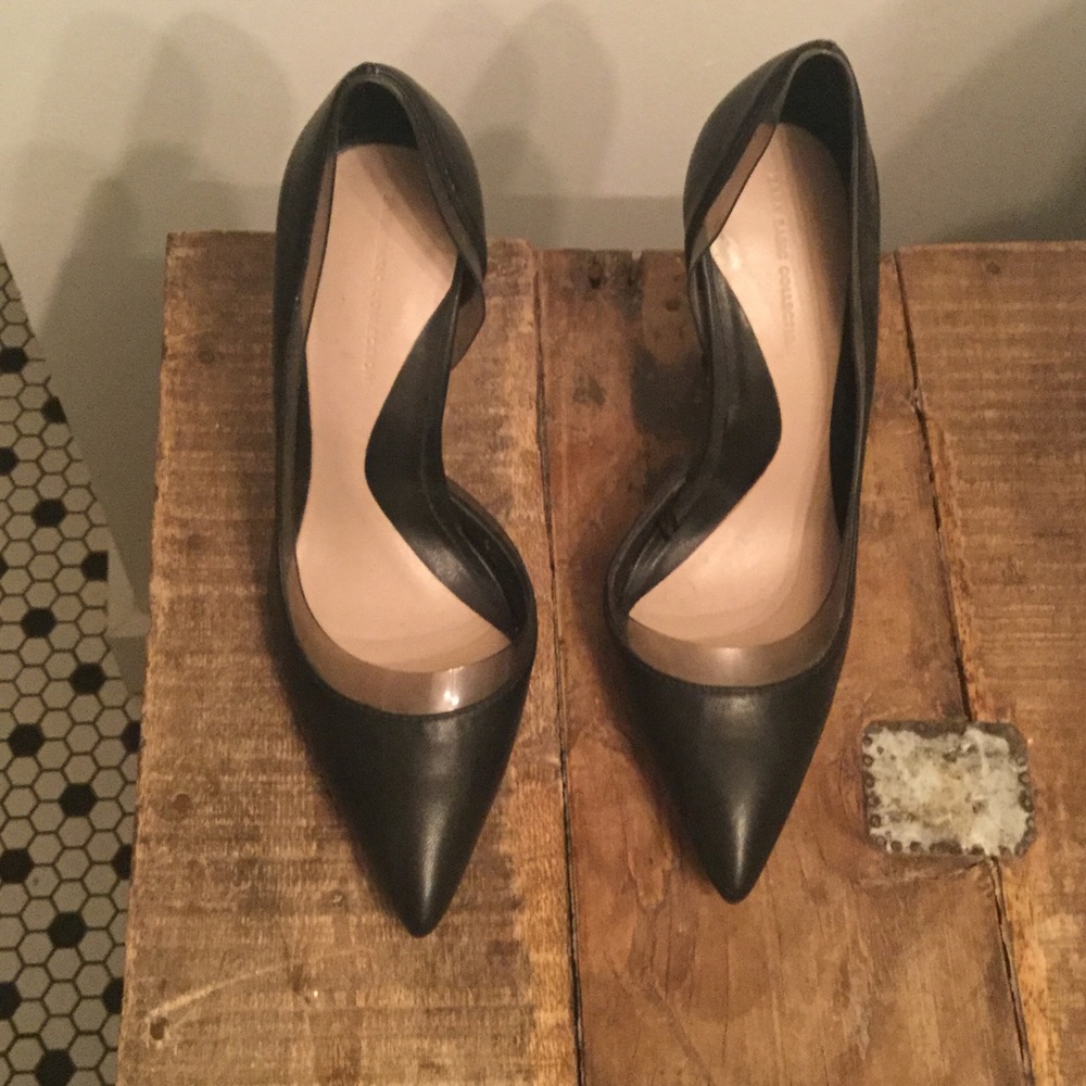 Black leather pumps