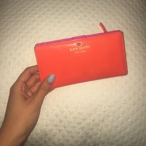KATE SPADE orange + pink leather wallet
