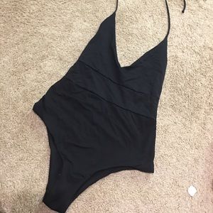 Black Tavik one piece