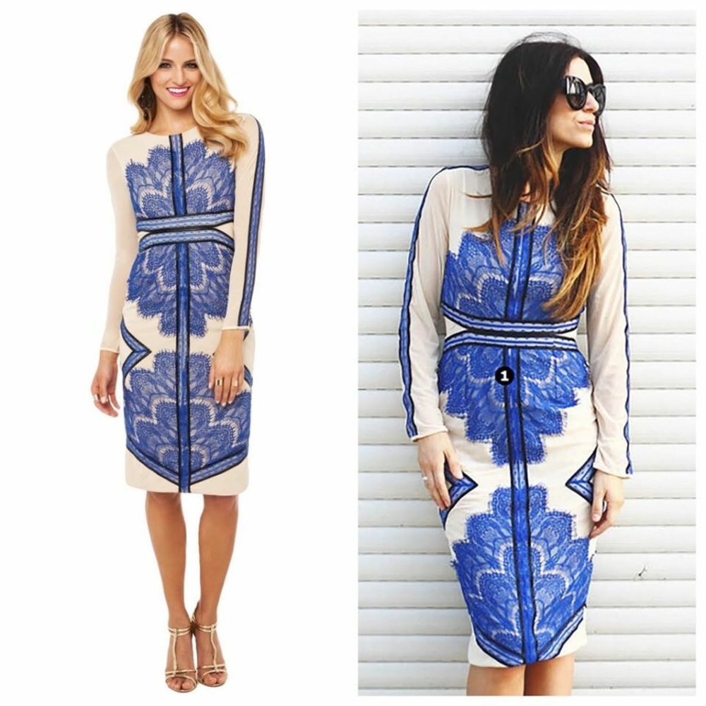 Long sleeved below knee dress with lace appliqué