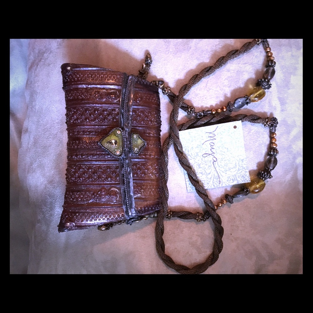 Amber Maya carved bag