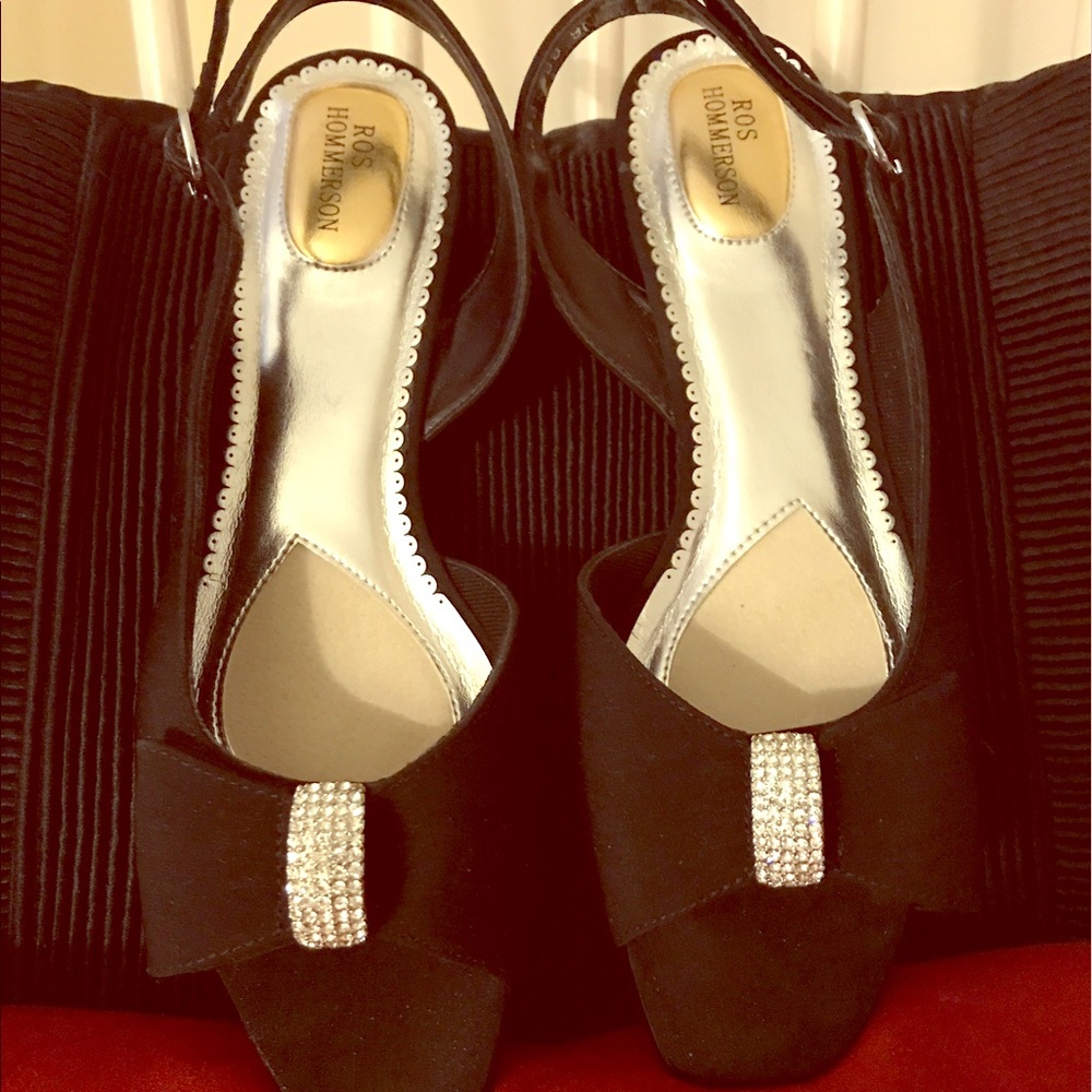 Cute evening sling back shoe with low heel.
