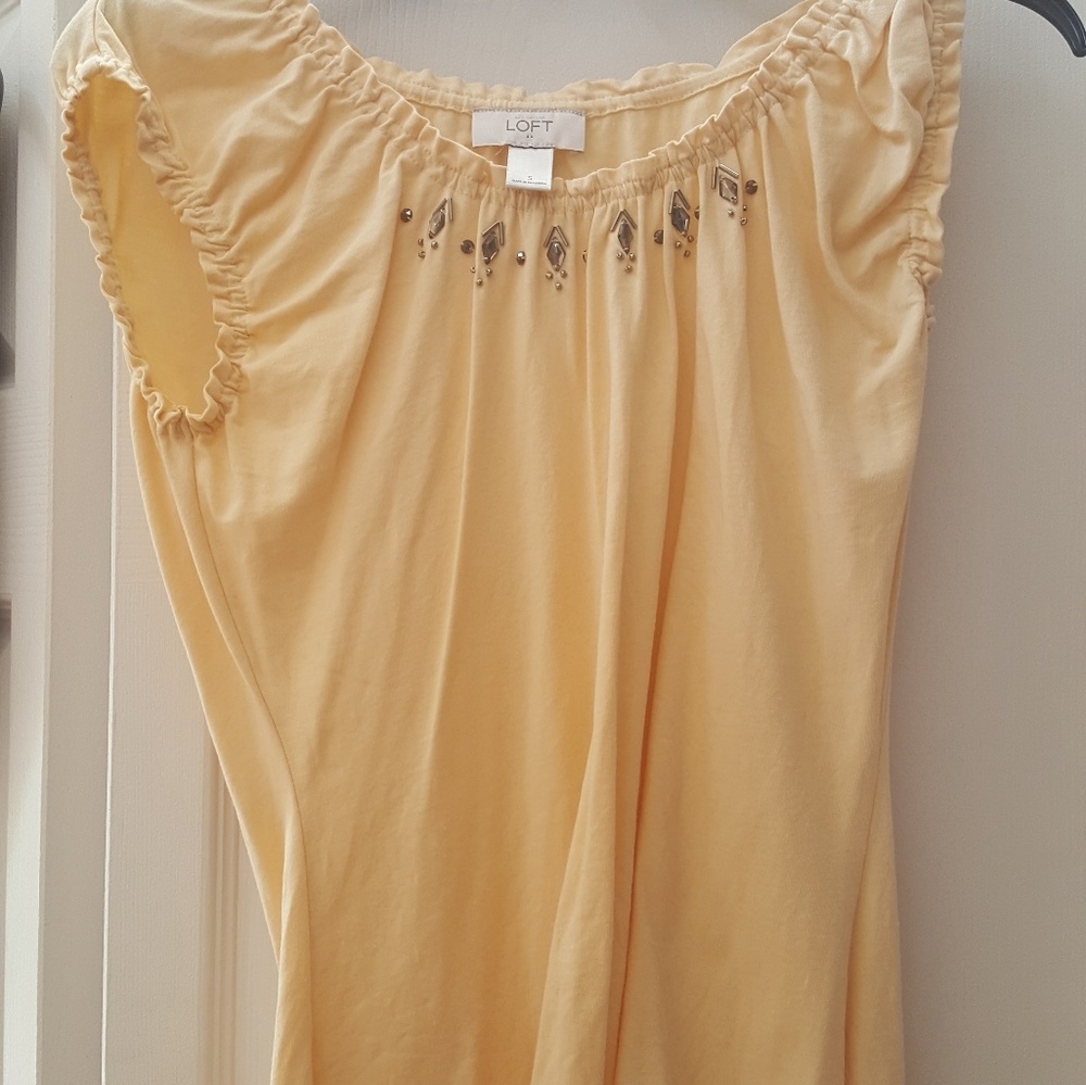 Yellow top with rhinestones on neckline