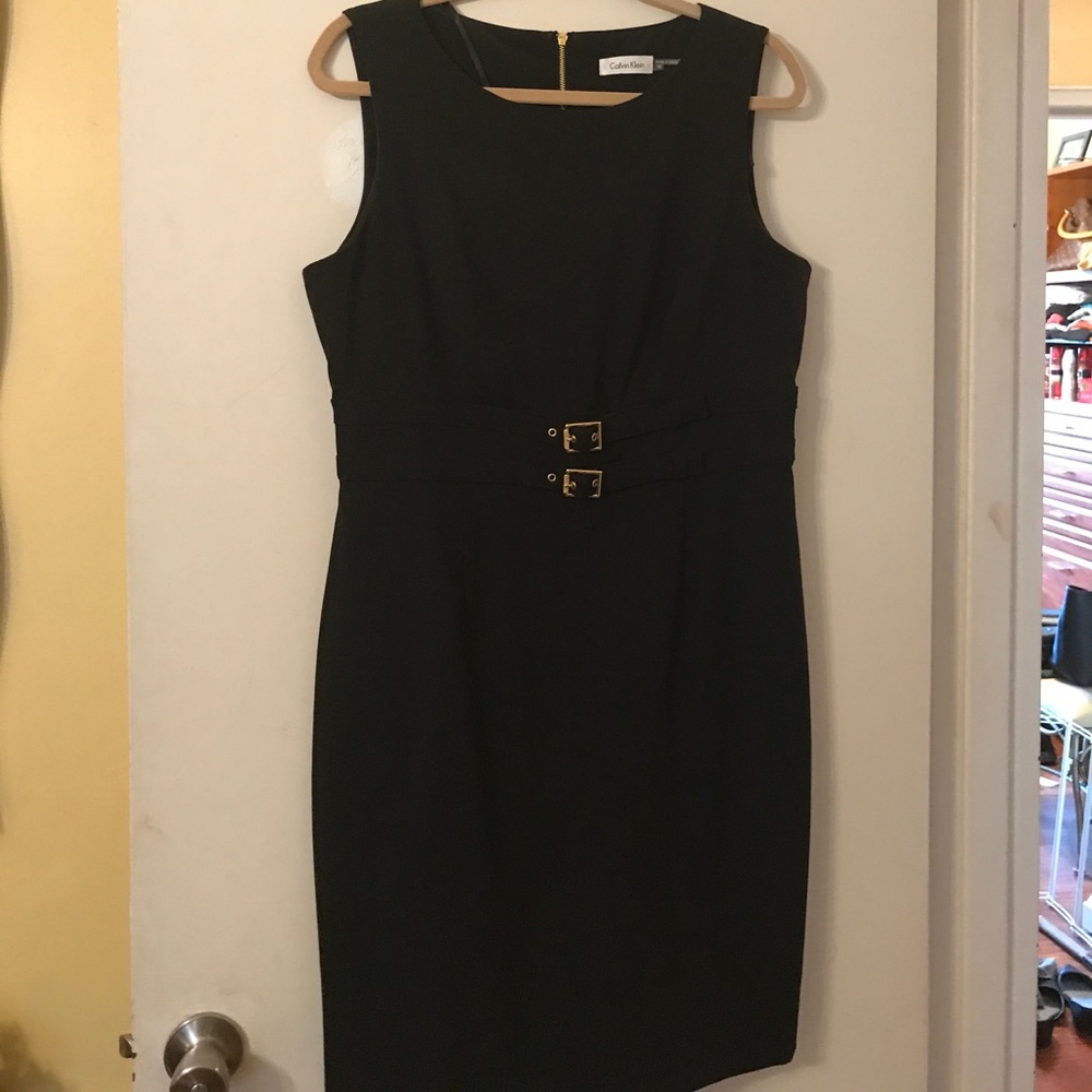 Black Calvin Klein dress with gold details