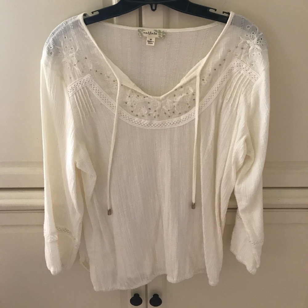 Nurture shirt size M