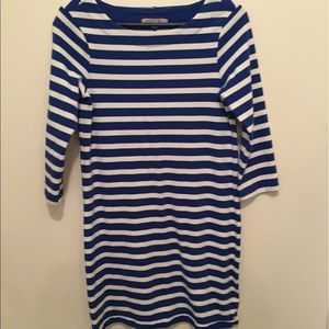 Blue striped mid-length dress.