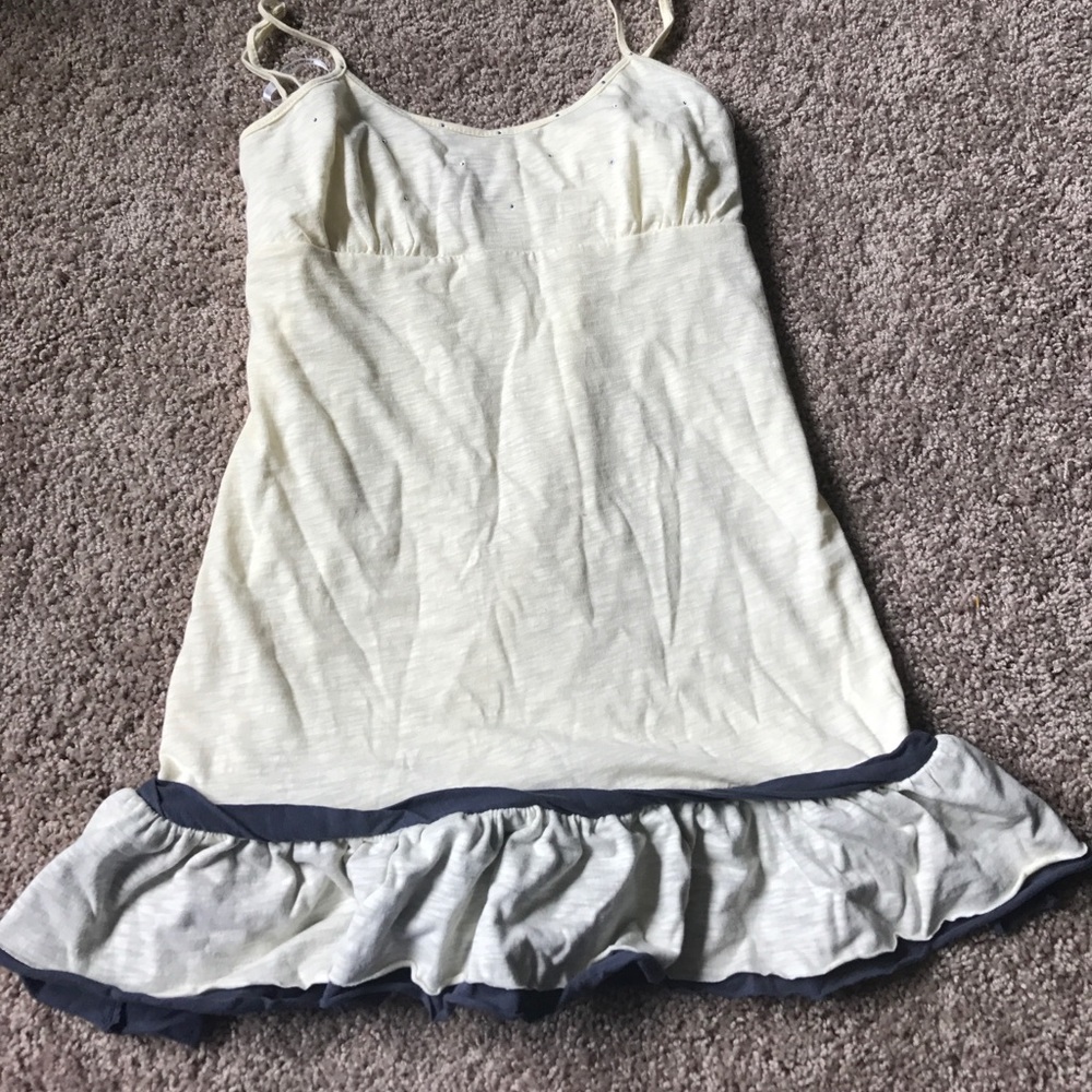 Long tank top with ruffled bottom. New with tags