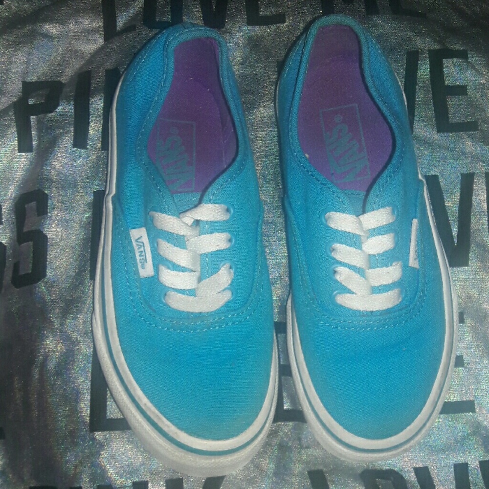 Teal colored Vans