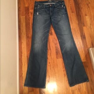 7 jeans. Dark wash lightly distressed