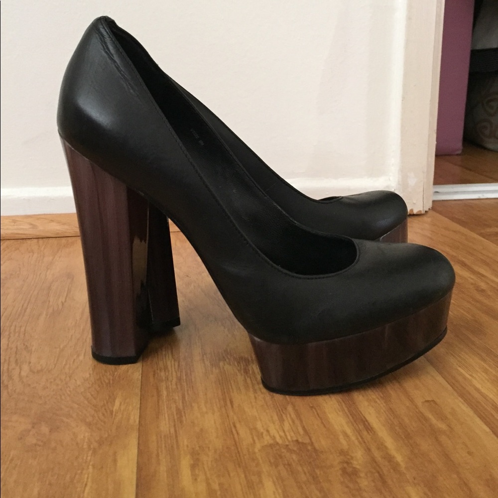 Black platform pumps