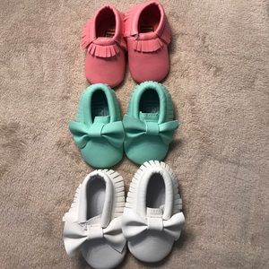 Three pair of baby moccasins. Like new condition