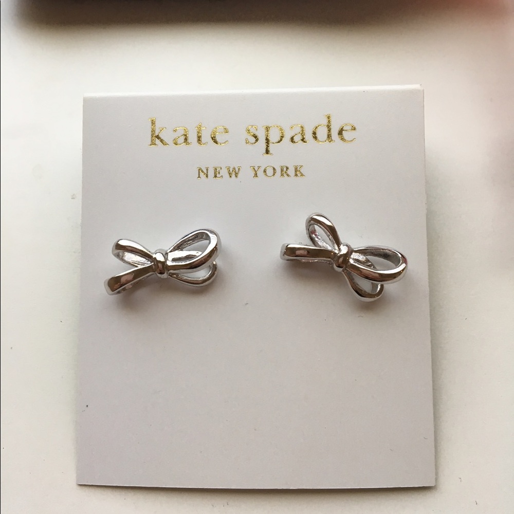 Kate spade silver tone ribbon earrings studs
