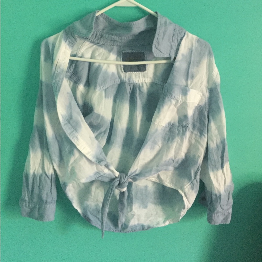 A light blue and white shirt.