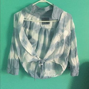 A light blue and white shirt.