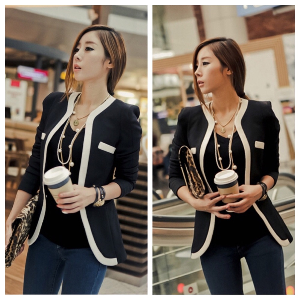 Black blazer with white trim detail