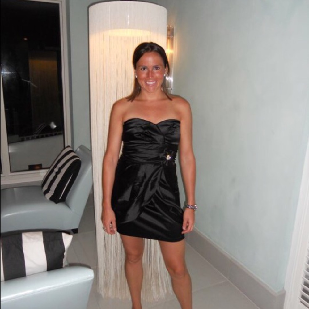 Black mini dress with flower embellishment