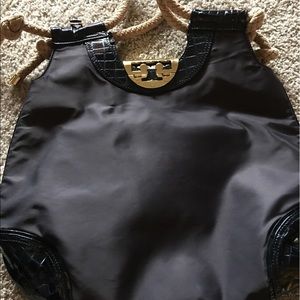 Tory Burch hand bag dark blue vinyl bag.