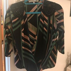 Beautiful long sleeve shirt with sequin detail