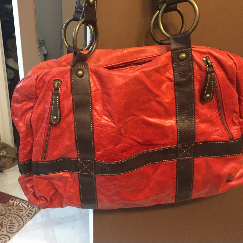 Red leather handbag on sale