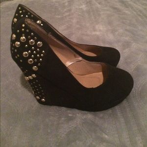 Black wedge heels wth studs.