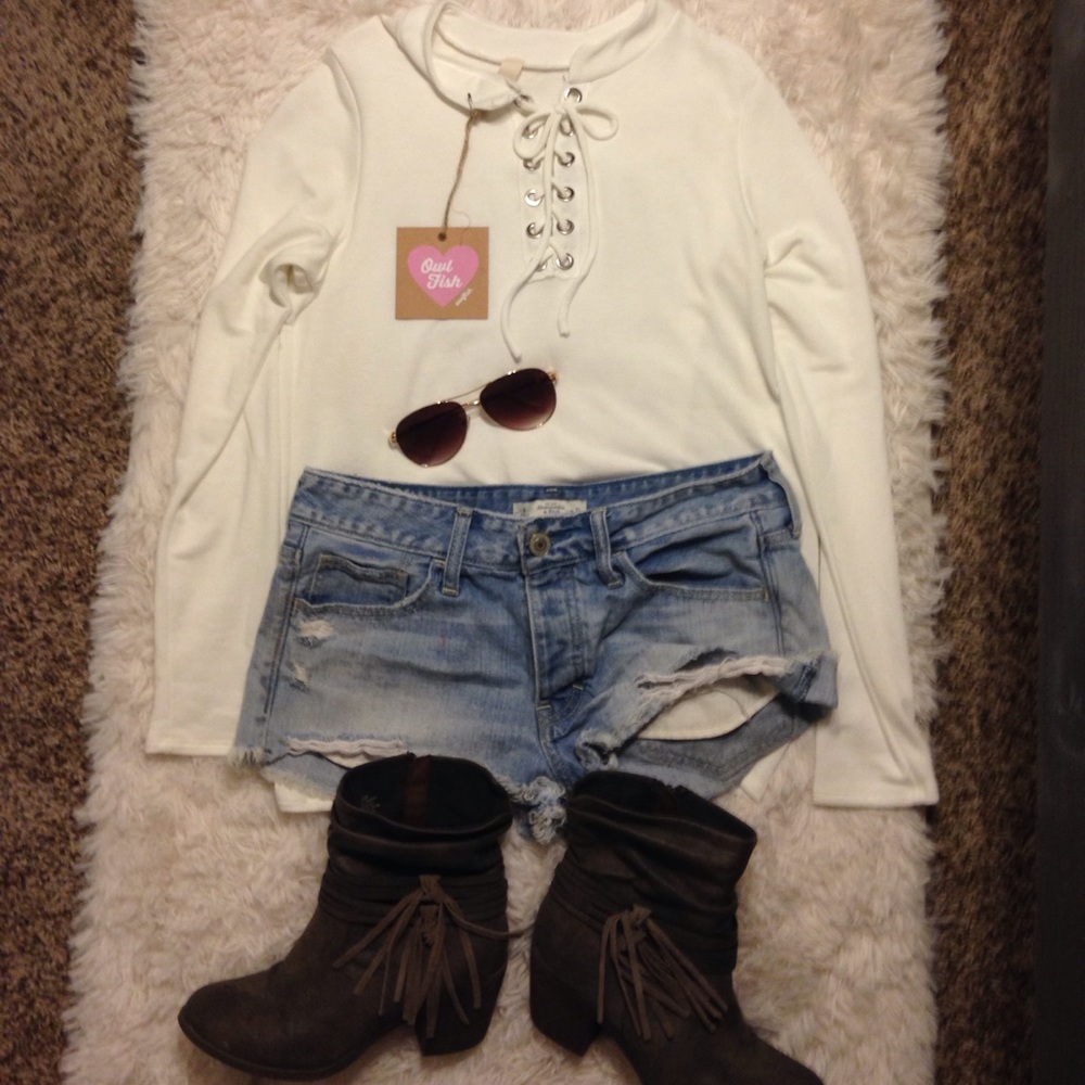 Brand new white long sleeve criss cross detail top