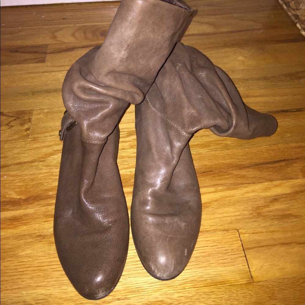 Gently used Stuart Weitzman brown leather boots