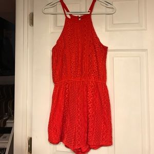 Adorable lace romper in coral color