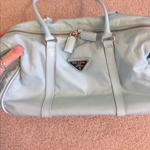 Blue Prada barrel bag