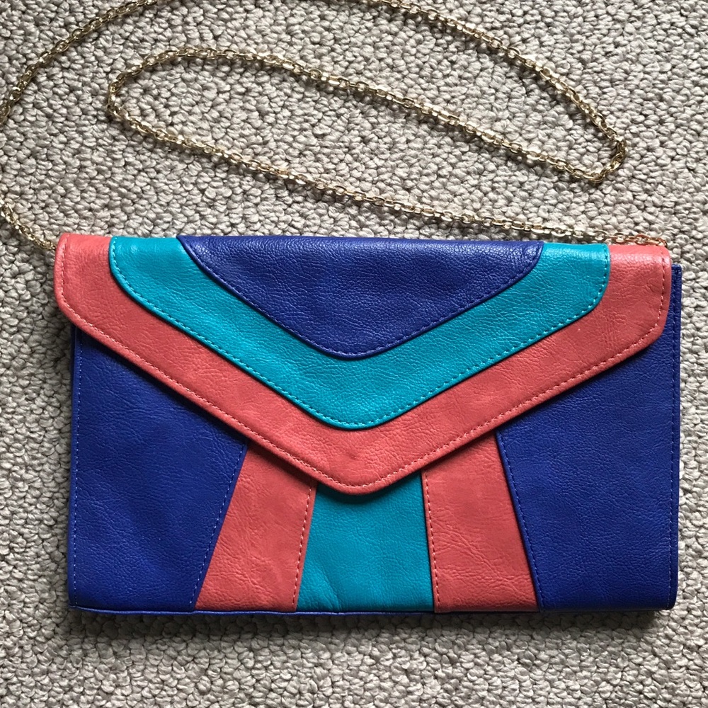 Expressions purple pink and  blue clutch brand new