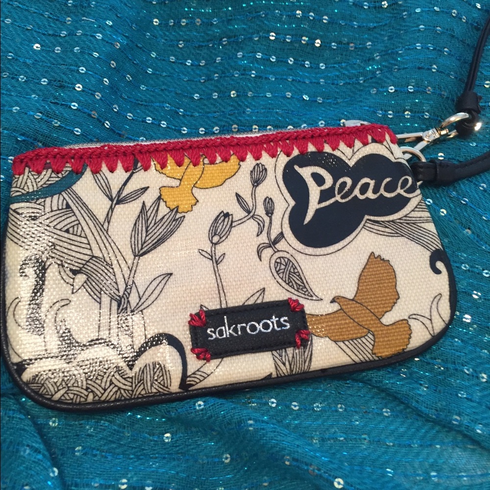 SALE!! SAKroots wristlet; never used. 7" across.