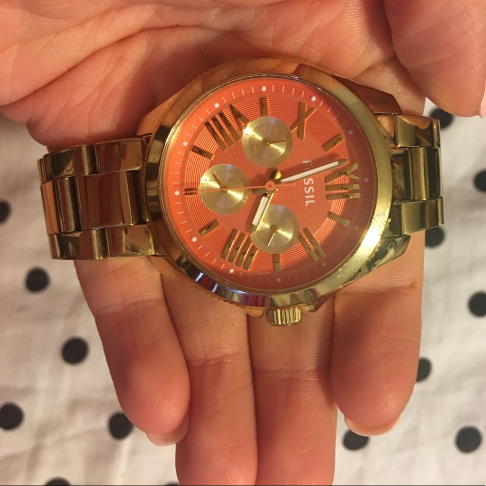 Gold fossil watch with pink face