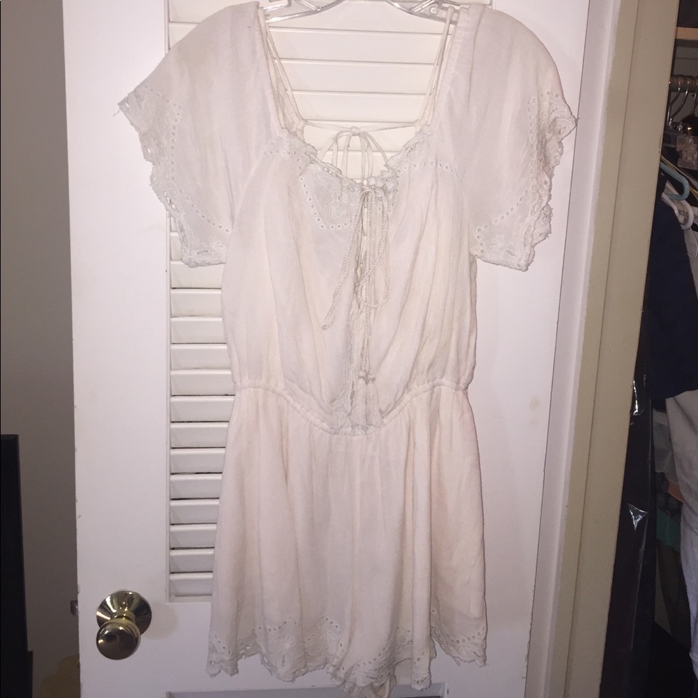 Free people ivory romper size M
