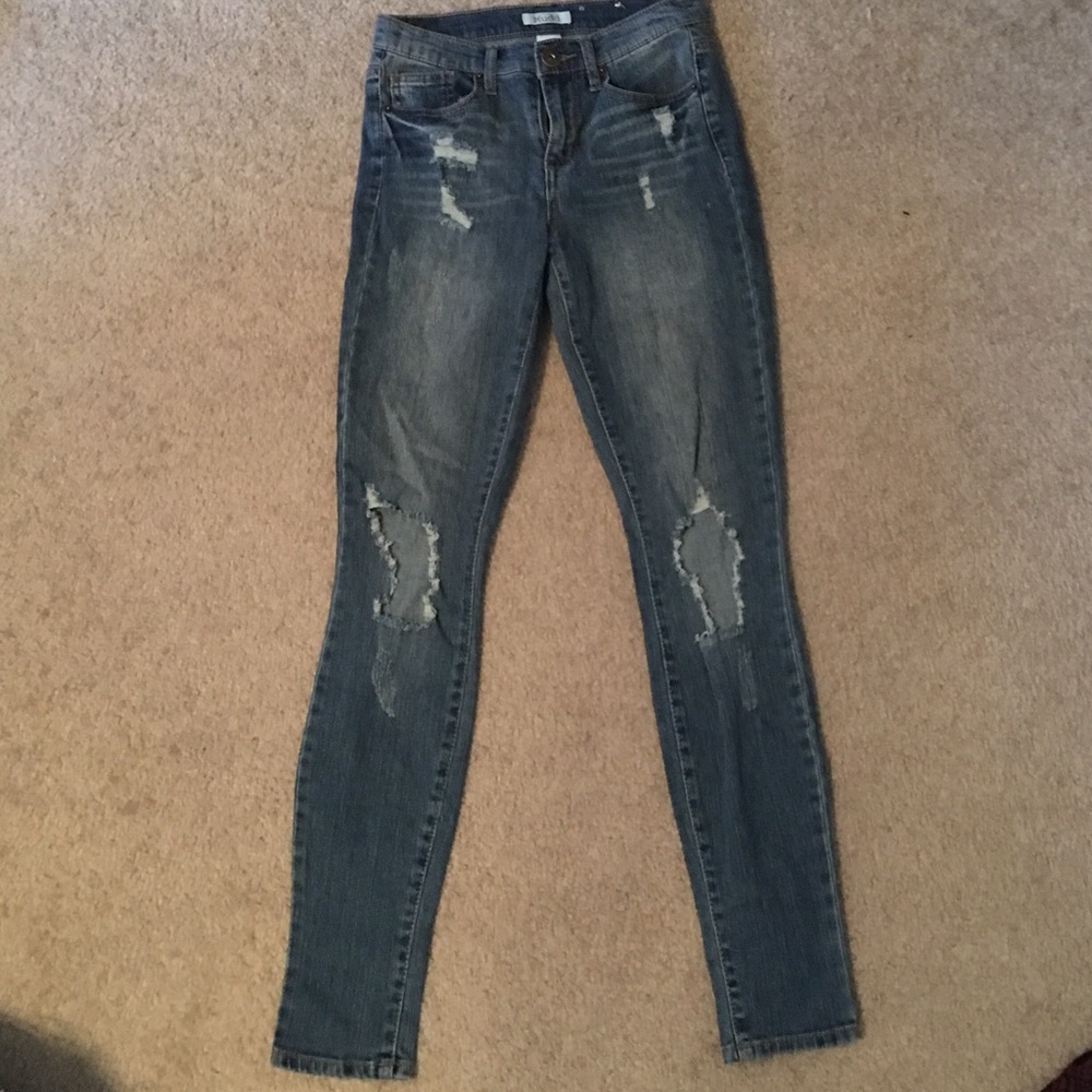 Distressed big ripped jeans