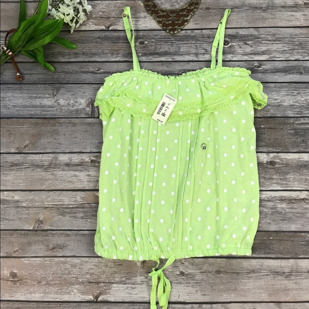 Green polka dot top