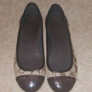 Coach flats.
