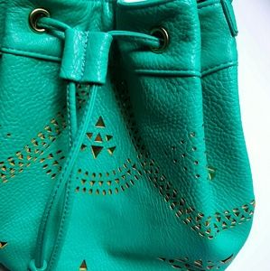 Bucket bag with gold lasered details