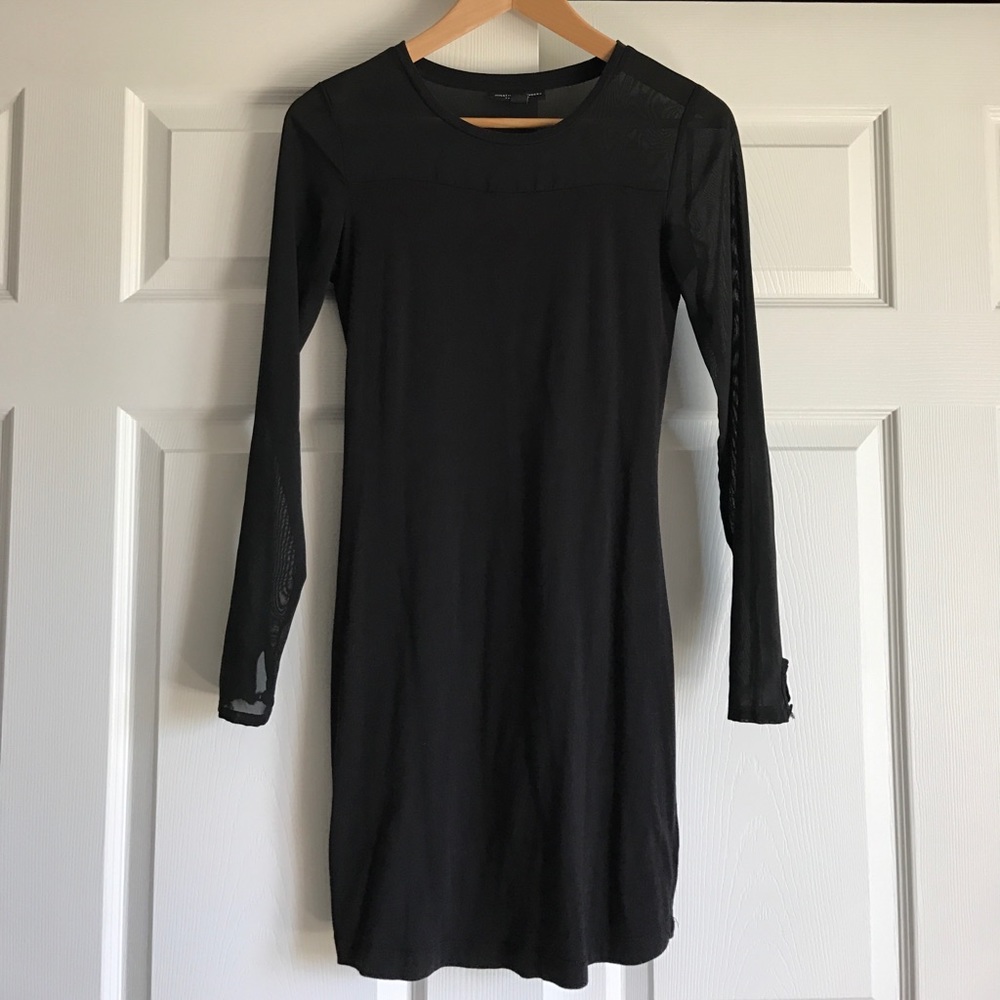 Black bodycon dress with sheer sleeves