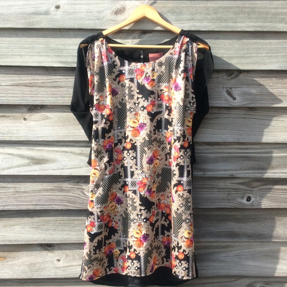 Pretty black dress with mock caplet