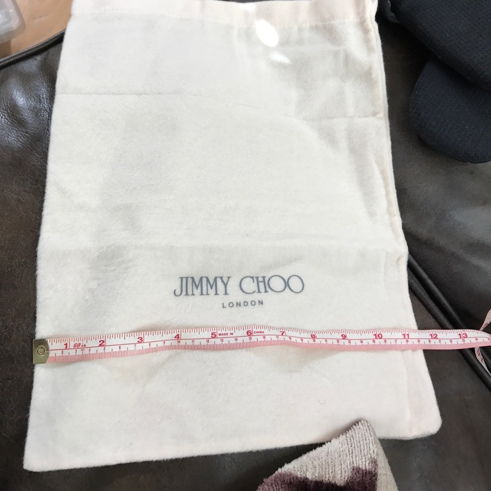 Brand new Jimmy  choo London light pink dust bag
