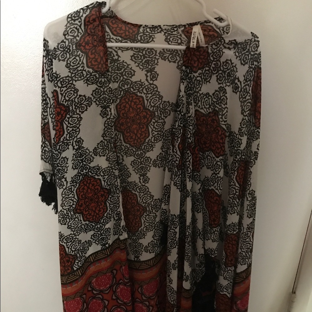 Beautiful see through shaw. Never worn.