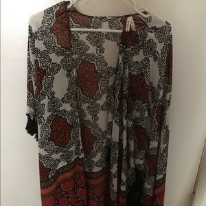 Beautiful see through shaw. Never worn.