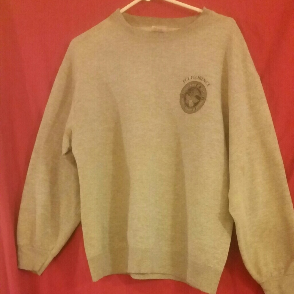 Like new grey sweatshirt with Emblem